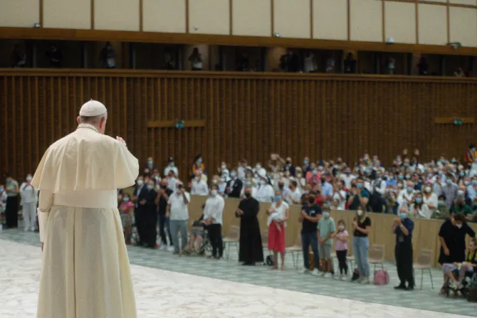 Pope Francis waves to people at the general audience Aug. 18, 2021